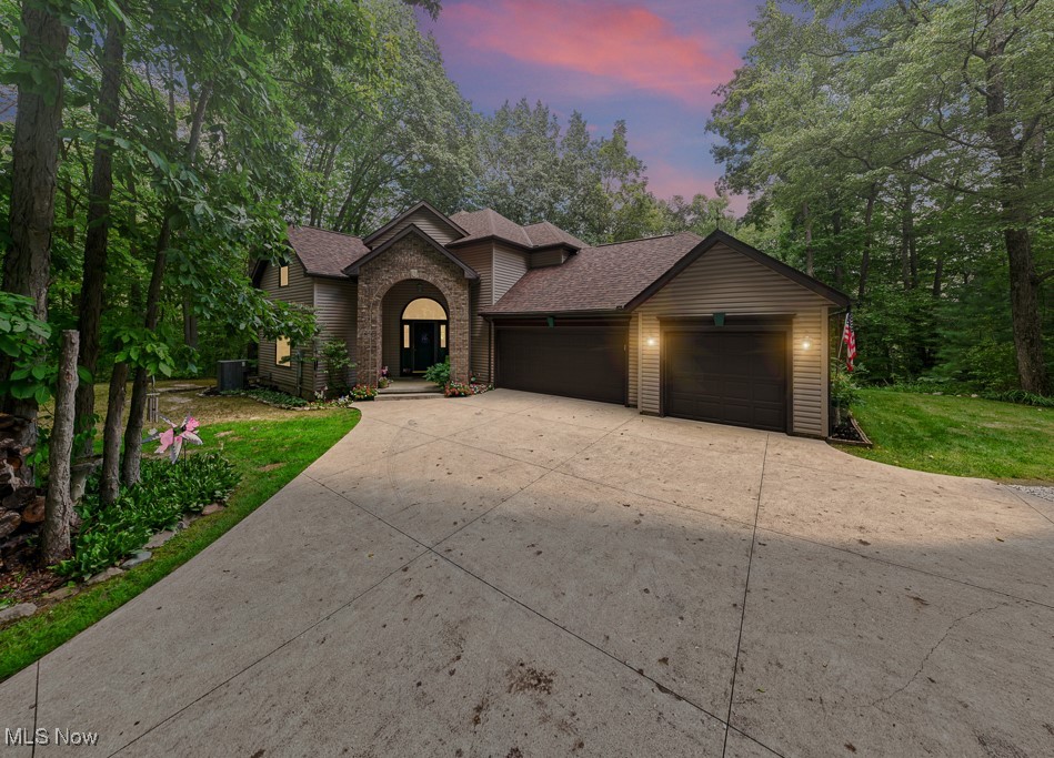 Welcome home to this one of a kind property! A picturesque private retreat nestled in the heart of Valley City. Step into this beautiful residence that has been freshly painted and be greeted by a spacious, light-filled entrance foyer with a circular staircase. The open floor plan seamlessly connects living, dining, and kitchen spaces. The kitchen features a large walk-in pantry and kitchen island for extra working space. High ceilings and large windows frame tranquil views of the lush, landscaped grounds, while gleaming hardwood floors add warmth and sophistication throughout. The spacious family room is anchored by a stone fireplace, creating a cozy atmosphere during Ohio’s chilly winters. Sliding glass doors lead to a generous deck—perfect for summer barbecues, outdoor dining, or simply relaxing as you take in the beauty of your surroundings. Formal dining room offer ample space for celebrations and gatherings. The finished basement provides even more living space, full bathroom, a large recreation area and a wood burner stove. There’s abundant storage and the flexibility to tailor the space to your needs. Step outside to your own private oasis, park-like setting with walking paths, bridges and 1/4 acre pond. The property is landscaped with mature trees offering shade and privacy. The expansive deck and patio area are perfect for alfresco dining and outdoor gatherings. A well-kept lawn provides space for play, gardening, or simply enjoying the peaceful ambiance of Valley City. Enjoy the peaceful privacy while being so close to major highways and amenities. Winter Brook Dr is situated in a safe, friendly, sought-after neighborhood known for its welcoming spirit and well-kept homes. Easy access to top-rated schools, shopping, dining, and recreational facilities. Valley City is celebrated for its small-town charm, beautiful parks, and convenient proximity to major highways, making commutes to Cleveland or Akron effortless. See Supplements for ADDitional INFOrmation.