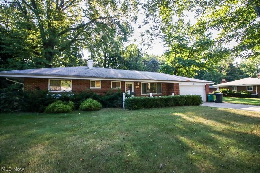 Welcome to this move-in ready beautiful brick ranch on a half acre on a quiet cul-de-sac in desirable Mentor, close to all the shops with many updates! Here are some highlights of the home: The vaulted living room leads to a dining area with a beautiful view of the backyard. The kitchen, which was remodeled in 2017, has solid wood cabinets, quartz countertops, a glass backsplash, and luxury vinyl flooring. There is a large mudroom/laundry room which leads to a patio overlooking the wooded beautiful fenced in yard! The primary bedroom has an en suite bathroom remodeled in 2021 with a walk-in glass shower.  In addition, there are 2 more bedrooms as well as a bathroom remodel in 2021. Both bedrooms have the view of the backyard as well. All appliances are less than 5 years.  One last update is a high-efficiency furnace in 2019.  This home will not last long on the market! Come check out the upgrades and beautiful home before it is too late!