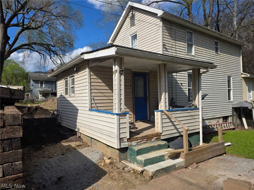 Three Bedroom home conveniently located in East Liverpool Neighborhood.  Some nice updates already done.  Several others are still being worked on.  Newer Plumbing and Electric Panel.  Gas Heater in Basement.  A 3rd Bedroom has been added to the first floor.  Nice Dining Room and Living Room.  The Kitchen, Bathroom, and upstairs Bedrooms are still being worked on.  Recent updates include:  Electric and Plumbing '25 and '26, Roof over 3rd Bedroom Addition and Garage '26, New Retaining Wall and Sidewalk '26.  The following items are also in progress - Painting, Flooring, Upstairs Bathroom, updating Kitchen.  This Home is close to the Ohio River and main traffic arteries into Town.  Come Take a Look.  Make this Home Your Own.