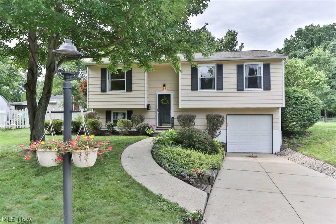 This modern, move in ready home has had many updates since 2014! The open, eat in kitchen features new, solid maple cabinets (2012), white tile backsplash, concrete countertops, new light fixtures, and an island perfect for entertaining. Appliances are included. Rounding out the main level is the inviting sun room with deck access, an open-concept living room, 3 bedrooms, and full bath. The lower level features a laundry room, full bathroom, office, and bonus room.
Hardwood floors throughout the home, new fans and light fixtures, a new roof (2016), and replacement windows are just a few of the great updates to this home!