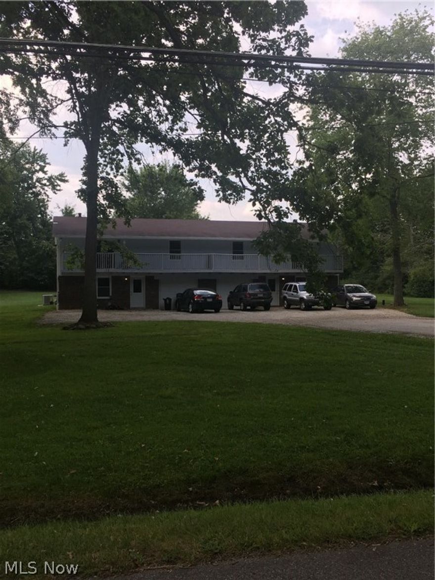 Nice opportunity in a great location.  This well-cared-for two (2) unit offers nice size rooms, separate utilities, attached middle garages with lots of parking spaces on a level lot. Some of the updates in last two years include vinyl windows, furnaces, light fixtures, central air units, hot water tanks, insulated garage doors, screen doors, slider doors, carpeting, vinyl flooring, refrigerators, CO and smoke detectors hard-wired in, downspout lines and drains, and freshly painted throughout. Property has been converted to forced air gas heat.  One of the sheds is brand new.  Room measurements: Living 12x17, kitchen 15x12, master bedroom 11x14, 2nd bedroom 11x10, family room 11x18, and utility/laundry 14x19 each side. Nice enough to easily live in one side and immediately rent out the other. Appliances include 2 refrigerators, 2 stoves, 2 dishwashers, 2 central air units, 1 water softener, and 1 sump pump.  Brick, block and cedar sided exterior. Upper wood deck measures 69' x 4' with