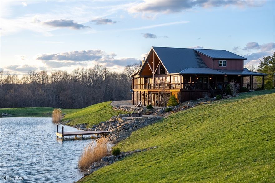 Tucked into 851 acres of rolling ridges, timber, and spring-fed ponds, this one-of-a-kind estate in Muskingum County
offers the rare chance to own a proven legacy hunting property with unmatched natural beauty. Featured in *North
American Whitetail*, this tract is home to elite genetics, a documented trophy history, and over 80 sheds found in a
single season. Nearly a mile of bordering no-hunting ground (10,000+ acres) creates a wildlife haven with consistent
mature buck movement. The custom 5,300 sq ft lodge is built for gathering-5 bedrooms, 3.5 baths, vaulted ceilings,
finished walkout basement, and a wraparound deck with panoramic views of the pond and wooded hills. The stamped
concrete patio and firepit overlook unforgettable sunsets. Geothermal systems, a climate-controlled 4-car garage, and
spacious living areas offer comfort whether you're hosting or unwinding after a long hunt. 25 miles of internal trails,
food plots, strategically placed blinds, apple trees, stocked fishing ponds, and a 1,000-yard shooting range round out
the outdoor experience. The finished pole barn includes a basketball hoop, high-clearance doors, and a
covered bay for hanging deer or boiling maple syrup. Public water, drilled well, developed spring, and easy access to
I-70 and airports make this an exceptional basecamp for out-of-state hunters or land-focused investors. 

This isn't just land-it's the kind of ground hunters dream about, families return to, legacies are built on, and value is preserved for
generations.

For additional photos, video, or more detailed information not included here, contact Rich Flowers directly.