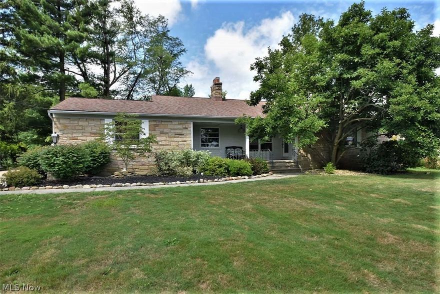 Fabulous sprawling front porch ranch, completely updated in today's decor! Located on the cul-de-sac on this quiet street. Enter through the foyer to be greeted by wide plank hardwood floor which are throughout a lot of this home. The living room  with a fantastic fireplace wall that opens to the sprawling  dining room which leads to the stunning state of the art kitchen with granite, subway backsplash , high end stainless steel appliances, an extensive island and loads of cabinetry & large  pantry which will delight any chef and opens to the deck which overlooks the large, lush yard ! There is a family room which could also be used as an office/media room. There are two oversized bedrooms and a full bath plus a private owner's suite addition with a gorgeous full bath with double sinks, an oversized shower, very large walk-in closet and access its owns own private patio. There is a finished inviting recreation room. Amazing storage.  Two car attached. Enjoy first floor living at its be