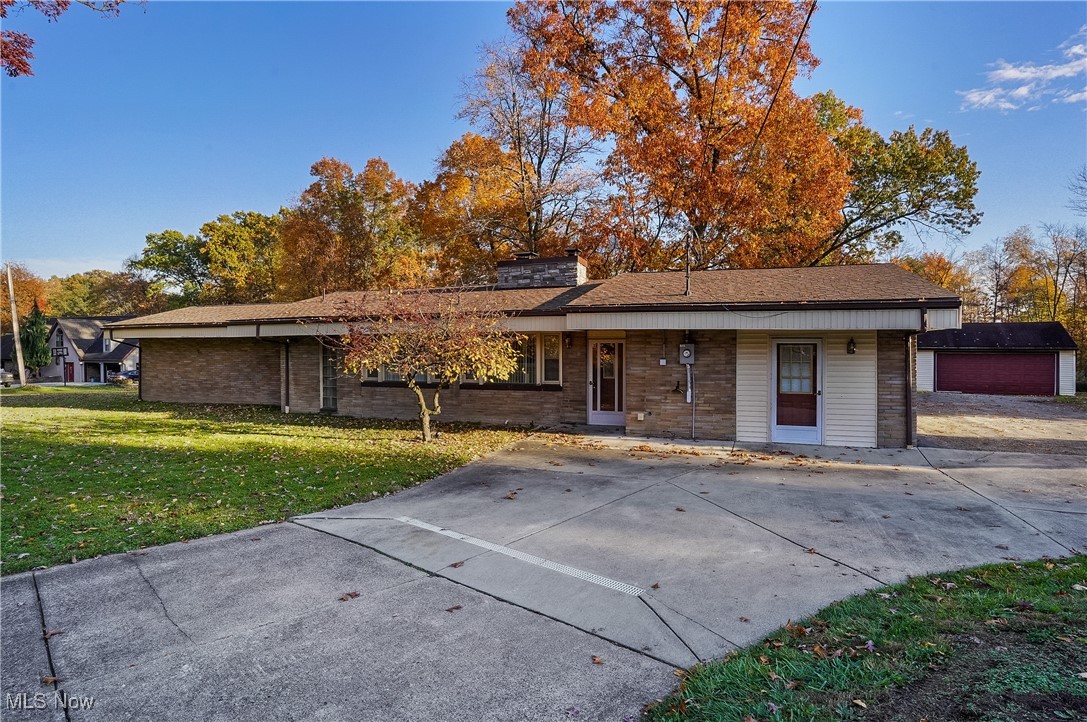 AWESOME 3-4 Bedroom Ranch Home with 3 Car Detached Garage on 1.32 Acre Private Lot. Home Features Include: Large Living Room with Floor to Ceiling Stone Fireplace, Eat In Kitchen with tons of Cabinet Space & Breakfast Area, LARGE Master Bedroom with 2 - Double Door Closets, 2 other Bedrooms & Full Bath. To the Right of the Front Door there is a 4th Bedroom & Half Bath or Office with Private Entrance. There is a Back Sun Room Area with Back Door which leads to the Private Back Yard & 3 Car Detached Garage. This PHENOMENAL Garage offers a pellet heater, completely plumbed for air and wired for 220. There is a separate shop and garage area. It also offers a Backyard Buddy 4 Post Vehicle Lift. Updates Include: New Furnace - 2010, New Roof - 2014, New Flooring & a Fresh Coat of Paint.
