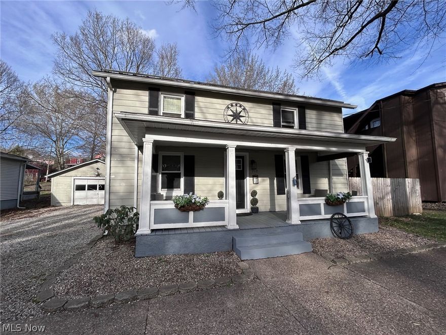 If you’ve been searching for a home with historic charm but want the major interior updates already completed, this 1890 beauty is ready to welcome you home. Step inside and you’ll immediately appreciate the character paired with thoughtful interior renovations. Laminate flooring flows throughout, creating a clean, cohesive feel. The fully remodeled kitchen is a standout feature, offering granite countertops, updated cabinetry, and a spacious walk-in pantry — ideal for both everyday living and entertaining. 
The main-floor bathroom has been completely renovated and smartly designed to include a convenient laundry combination. Upstairs, a second bathroom already has fixtures in place and simply awaits completion — providing a great opportunity to add additional value over time. A newly constructed staircase leads to the second level, where the primary bedroom showcases exposed ceiling beams for added warmth and architectural charm. You’ll also appreciate the abundant attic storage — a rare bonus in many older homes. Major improvements include a newer metal roof and replacement windows, offering peace of mind on key components. Situated on a double lot, the property provides an abundantly large backyard enclosed by a newer wood privacy fence — perfect for pets, play, gardening, or creating your own outdoor oasis. The oversized single-car garage offers off-street parking, and alley access allows convenient entry to the backyard. Covered front and back porches add inviting outdoor living spaces to enjoy morning coffee or evening relaxation. While most updates have been focused on the interior, the exterior offers an opportunity for cosmetic improvements, allowing a homeowner to build equity and truly make this property their own. 
A wonderful blend of historic charm, modernized interior spaces, and outdoor potential — ready for its next chapter.