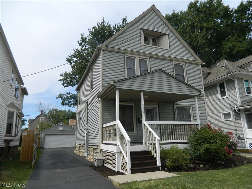 If you've been looking for the perfect combination of location, size, layout, and modern updates in a classic Lakewood property - look no further. Welcome to 1492 Elmwood. Incredibly well-cared-for, this home at the heart of the city boasts striking wood floors on the main level, newer windows, and an open concept kitchen complete with a cool backsplash, under-cabinet lighting, and a breakfast bar. Whether you start your tour by walking up onto the low-maintenance trex front porch, or making your way through the new gate into the newly fenced-in backyard, you'll know right away you've found something special. The back deck has been freshly painted, and the 2 car garage was built in 2014. The roof on this home is just 11 years-young. Inside, high ceilings make this already spacious home feel even more comfortable, and you'll enjoy being able to access your staircase to the second level from either the foyer or the kitchen! A full bath and 4 bedrooms await you upstairs, with the largest