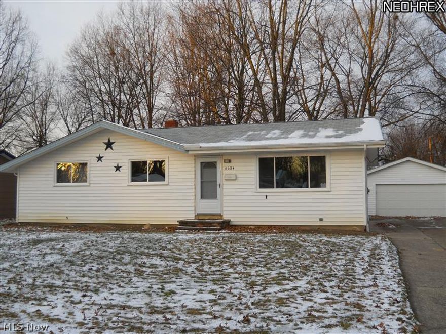 Amazing 3 bedm ranch. All NEW  11-13....Windows, exterior doors, Patio Door, refinished wood floors, laminate tile in kitchen and baths, lighting fitures, kitchen and bath fixtures, all kitchen cabinets, counters, kitchen appliances, island, bath tub, tile, bath vanity, neutral paint colors.  Updated electrical box, newer furnace, central air and H2o, basement windows, completely renovated half bath in basmt, NEW 2013 basement carpeting, ceiling, lighting. Newer Basement Windows, Two Plus car garage, extra wide driveway, large lot, storage shed, back patio and so much more!