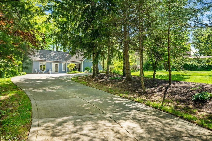 Remarkable unique home in a wood setting featuring numerous amenities you will not want to miss out on. First floor master, lofted office space, walkout basement, outside entertainment spaces and much more. All 3 floors feature a full bath and the walkout basement offers a recreation room or possible 3rd bedroom. Don't miss out on this great home!