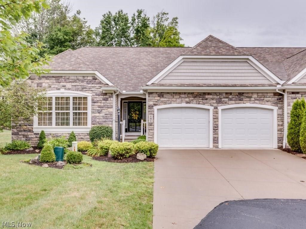 Spectacular ranch in award winning North Point at Hunters Crossing. Attention to detail throughout! Featuring vaulted ceilings, crown moldings, skylights, plant ledges, offset oak cabinetry with under counter lighting, stainless steel appliances, first floor laundry, wood flooring, handicapped accessible doors and shower in the master bedroom, the list goes on. Decorated to perfection, the entire first floor has been freshly painted in a color that is warm and trendy. The lower level walkout is magnificent. Boasting a full bath, extra kitchen, and a massive rec room, the entertaining options are endless. The beauty is not limited to the interior!! The perfectly manicured landscaping and trees will be enjoyed from the expansive deck that includes an retractable awning, or the covered patio from your walkout basement. Why not move to your own private retreat? Located close to everything but secluded for privacy, you will not be disappointed in this breathtaking home. Call for your privat