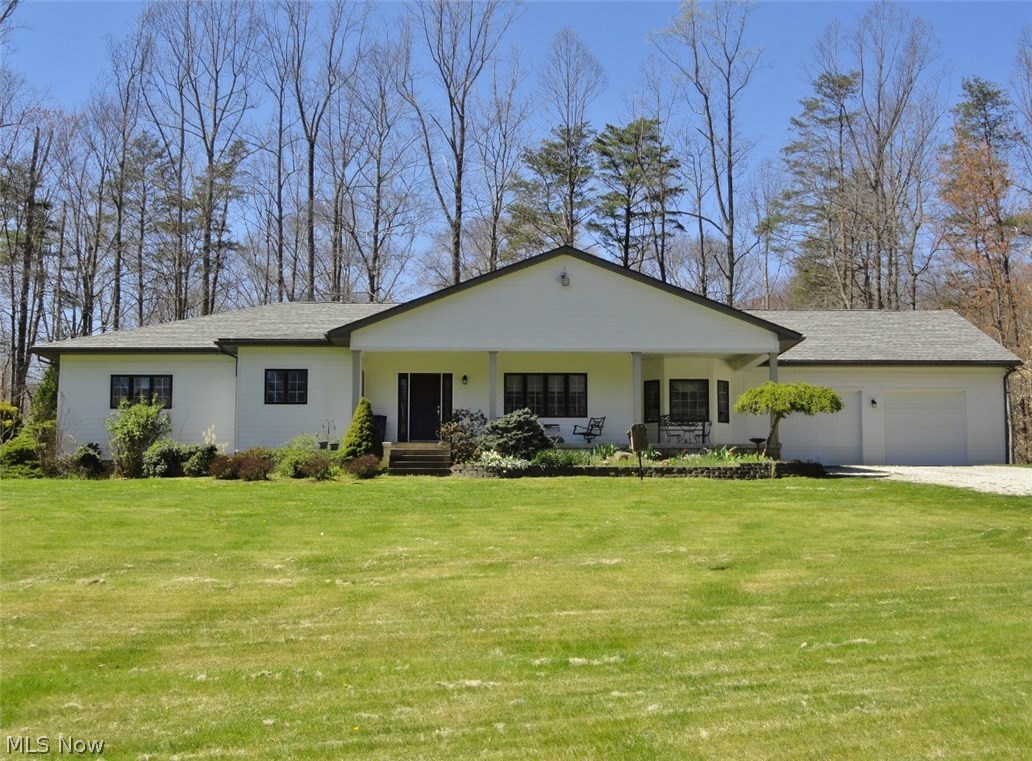 One of a kind very private setting located on private drive (.3 mi off OSM Pike). Easy access-9 foot ceilings throughout- 36"wide doors and extra wide hallways-make it easy for ADA if needed. Sunroom off kitchen with sky lites and wall of windows overlooking acres of woods & flowering trees-took 12 mos of construction to redo home after current owner purchased-sits on 26.59 ac. w/appx 5 ac of level open area and is surrounded by beautiful private woods-huge eat in kitchen, oversize Stilestone top center island &11X11 walk in pantry w/addl frig. Hurd windows, master bath has heated floors/soaking tub and lg shower, main living has beautiful oak floors. Open entry area- livingroom has a wall of custom built white fin.built ins with gas insert.With showing there is a full page of remodel information regarding the home- 2000 sq ft unfinished basement, poured concrete basement walls- tall ceilings, ready to finish with walkout. Basement area has an exercise area with rubber flooring. A m