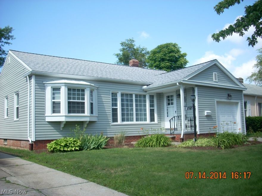 There is nothing more to be done in this home! 3 bedroom ranch with eat in kitchen, dining room and large living room. Homes upgrades include a newer roof, siding, windows, furnace, and electric panel. The kitchen appliances and washer and dryer are included. The covered concrete patio lets you enjoy the outdoors without being out in the weather. Attached one car garage. Finished rec room and half bath in the divided basement. This home is the complete package! Priced to sell!