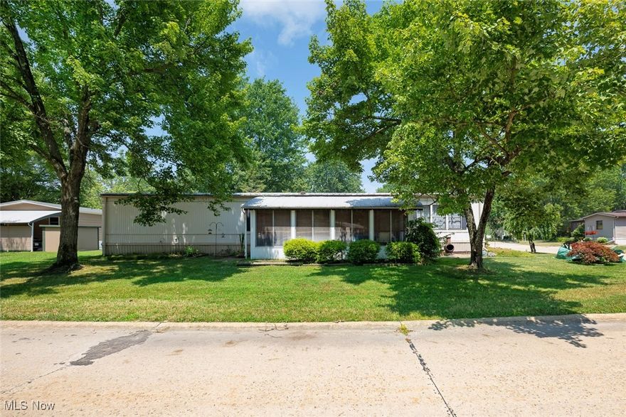 COLUMBIA PARK IS A 55 AND OLDER CONCEPT OF LIVING and is Ohio's Premiere Adult Land Lease Community! Amenities include: Gatehouse managed entrance! On site Shopping Plaza! On site Management! Walking Path/Dog Walking Path! Shuffleboard! Bocce Ball! Library! Crafts, and Social Hall!  WELCOME HOME to this adorable 1979 Schult single-wide manufactured home offering 980 square feet (70 x 14), 2 bedrooms, 1 large bath. Large living room and eat-in kitchen. Large three season sun room (22x11).  This home has a very open floor plan, very bright and airy, and nicely decorated. Absolutely inviting and you will love this home the moment you walk in!  Most of the flooring has been replaced.  This home also features a Metal Roof which is maintenance free.  Heat Pump needs to be repaired or replaced, home has been priced accordingly..... Why not set up your apt today!!