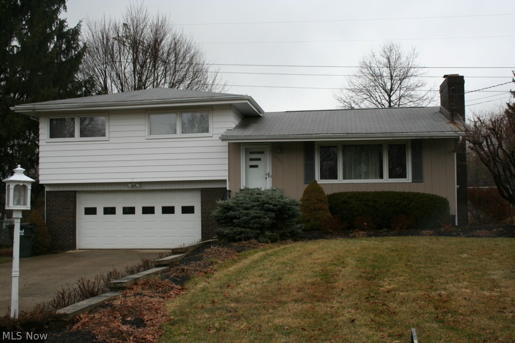 This home features many updates including newer carpet and ceramic tile throughout(2013), septic and high efficiency furnace replaced in 2010, chain link fence around entire backyard in 2011, main bathroom completely remodeled 2010 and new sump pump 2015. Along with being well maintained and conveniently located, this home features a slider that takes you out to a large beautiful deck and a brick patio overlooking the expansive back yard. The location offers easy access to the expressway, stores, emergency and fitness centers and is in the Green School District. This beautiful home is ready to move in and enjoy!