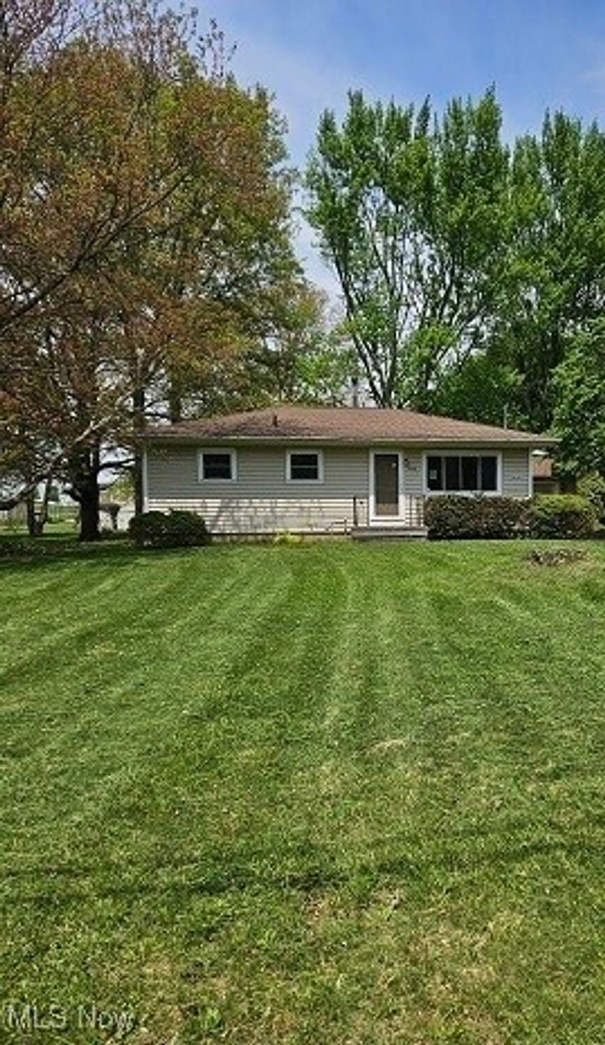 This classic ranch is ready for your personal touch!  It has 3 bedrooms, 1 bath and a full basement.  Off the kitchen is a screened in porch just a few steps to the one car garage. Mature trees offer shade on a sunny day, with a beautiful, large back yard for activities and fun.  This property is ready for you to make your own and new memories are waiting to be made.  It will go fast, make your appointment to see it right away!
