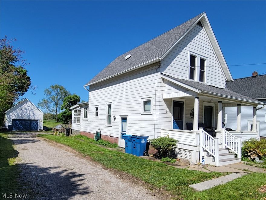 A cozy single-family home conveniently located in downtown Hartville, Ohio. The home features old-world craftsmanship, an enclosed back porch, a large backyard, a full unfinished basement, and the original wood trim throughout. There are two bedrooms and a master bath on the second floor. The main floor has a living room, kitchen, laundry room, dining room, and a second full bathroom. Several upgrades have been completed, including new windows in 2021, a new roof, and air conditioner in 2023. The GE stove and matching refrigerator are included with the purchase. For easy accessibility, the home is equipped with a long ramp to the back door, handrails in both bathrooms, and a stairlift to the second floor. The property is within walking distance of the historic district, shops, and restaurants, and only a short drive from Hartville Hardware, Hartville Marketplace, and local shopping centers.