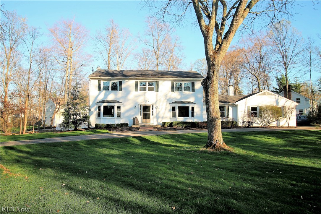 Gorgeous brick colonial with circular drive has a tranquil setting nestled on a beautiful landscaped lot with fenced in rear yard. This fabulous four bedroom, two full and one half baths offers an open flow floor plan, fabulous for entertaining. The foyer opens to the living room, and formal dining room each with gorgeous hardwood floors. Gourmet kitchen with maple cabinets, granite counter tops, recessed lights, ceramic floor and high end stainless steel appliances such as a sub zero fridge, dishwasher and oven new 2017 completes this amazing kitchen. The family room is open from the kitchen with hardwood floors, gas fireplace and built in bookcases with a Dutch door in the rear of the home. Completing the first floor is the half bath and laundry room. The upstairs consists of the large master suite with built ins and master bathroom which has a tile shower. There are three additional bedrooms some with California closets and cedar closets and offering full bathroom. The finished l