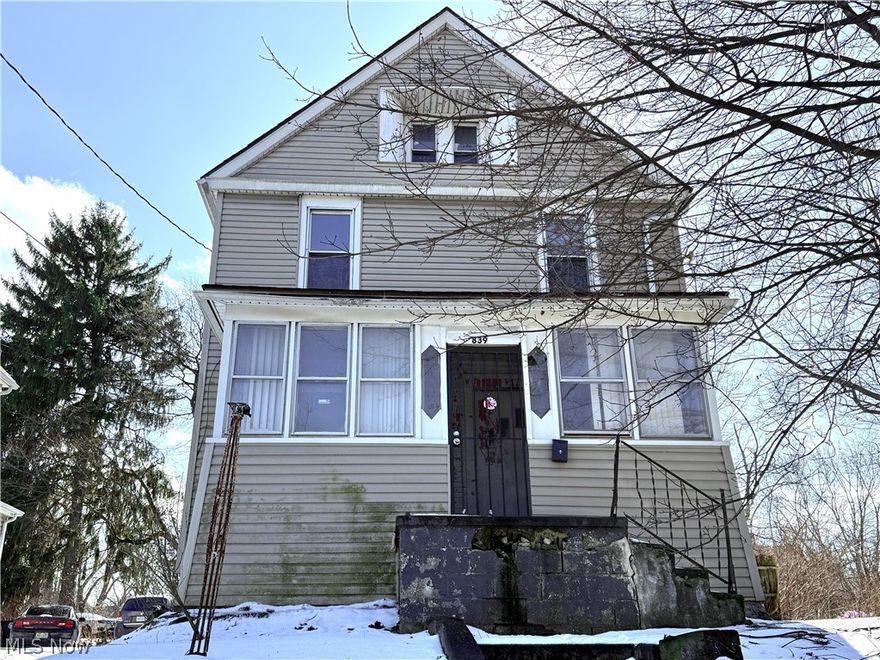 Welcome to 839 Kenyon Street in Akron! This spacious 3-bedroom, 2.5-bath home offers character, charm, and great potential. Step inside to find high ceilings and beautifully painted natural woodwork throughout the main level. The oversized Living Room and Dining Room provide plenty of space for entertaining or relaxing. A convenient full bath is located just off the Dining Room. Upstairs, you’ll find three comfortable bedrooms and a full bath featuring a classic clawfoot tub — adding timeless charm. The attic offers excellent storage space, and the full basement includes laundry. A carport provides covered parking. The kitchen is ready for your finishing touches (no appliances currently in place), giving you the opportunity to design it to your taste. This home is nearly move-in ready and offers a wonderful opportunity for an owner-occupant or investor looking to add value. With a little TLC, this property can truly shine! Schedule your appointment today!