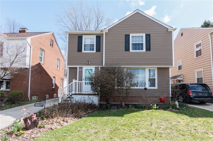 Welcome home to this charming and well-maintained colonial in University Heights. The spacious living room has multiple built-in shelves and a large picture window bathing the room in light. The kitchen features stainless steel appliances, contemporary cabinetry, solid surface counters, and has been opened to the formal dining room, giving it a great flow for entertaining. Off the dining room is a bonus room that could be a home office, playroom, or den. A half bath is also found on the first floor. Upstairs are three bedrooms, including a sizeable primary bedroom with two closets for plenty of storage. The full bathroom feels bright, fresh, and updated. Hardwood floors and original built-ins can be found throughout the home. Outside the backyard, offers a private patio with a pergola surrounded by gardens. All of this is located just minutes from shopping, dining, entertainment, hospitals, and universities. Schedule your showing today!