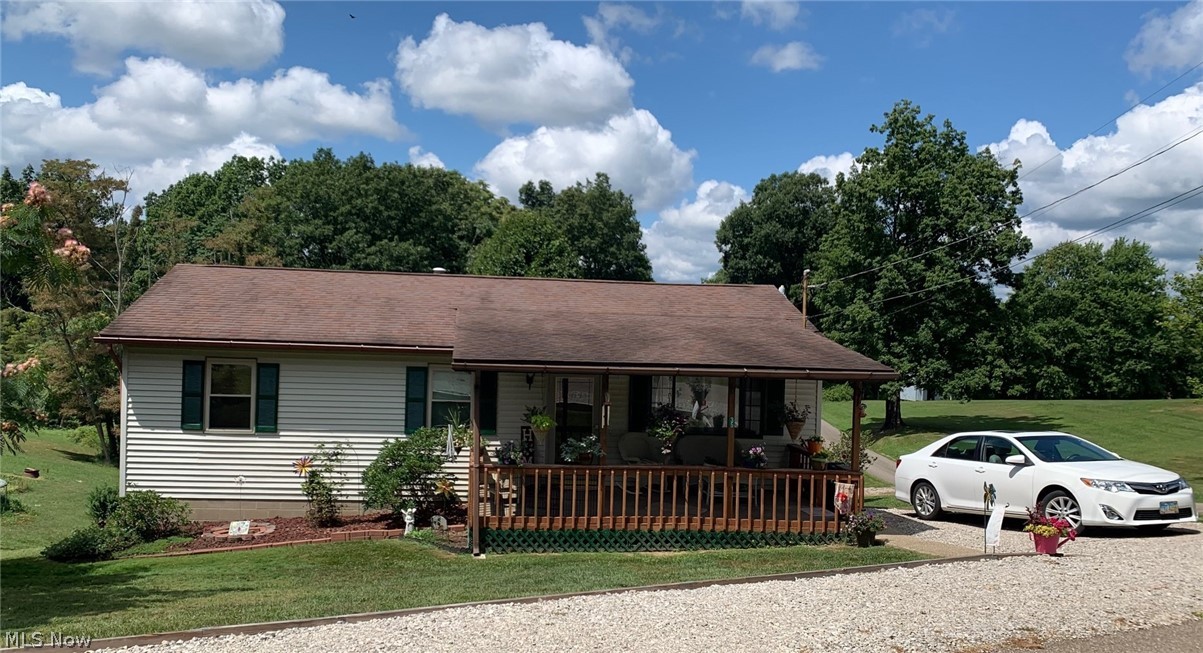 One owner ranch home, minutes from downtown but in a country setting sitting on just under an acre of property. Eat-in kitchen offers French doors to tiered back deck with one being covered for relaxing and entertaining. Living room leads you to a covered front porch. Lower level offers rec room and leads you to unfinished walkout basement that has lots of possibilities. Beautiful back yard setting offering a couple of blueberry bushes, cherry and apple tree. Replacement windows 4 years old. First time offered on the market, selling due to relocating.