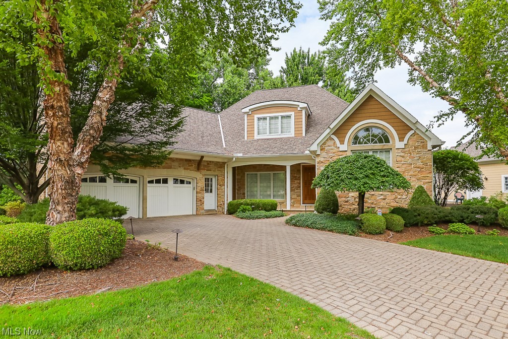 New photos are up. Photo 11-17 have been virtually staged. Welcome home to 24590 Chapparal #1 Westlake OH. This super sharp detached cluster, built by Valore, is your next destination. This cape cod is the best of both worlds. First floor living at its best with grand first floor owners suite and luxurious bathroom, first floor office/library, first floor laundry, first floor powder room, great room and a spectacular kitchen share a cozy fireplace. A slider from the kitchen walks out to the back deck revealing a park like setting and views of a pond w/fountain. But wait, in addition to the first floor, the second floor is home to 2 very generous bedroom each with its own full bathroom and abundant storage. And if that is not enough, the full basement is finished with daylight windows, a half bath and a stairway that walks up and out to the garage thru the unfinished portion of the basement. Last but not least, the oversized 2 car garage is heated, has utility tub and a walk up
