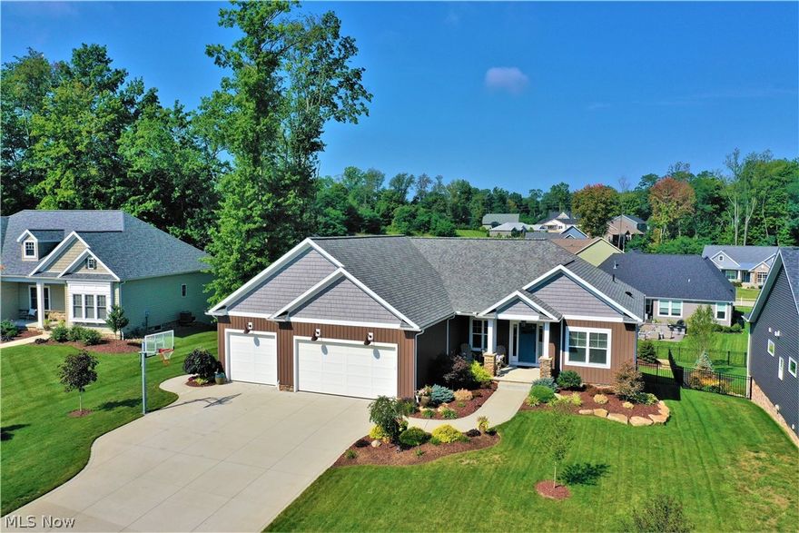 This luxurious & energy efficient ranch located in the sought after Kings Ridge development boasts 4 bedrooms & 3 1/2 baths. The open floorplan effortlessly balances functional living w/ a level of sophistication! The gourmet kitchen features custom cabinets, upgraded granite countertops, & black stainless appliances. The kitchen is open to the great room w/ incredible, 9 foot ceilings. The impressive master suite is split from the remaining bedrooms offering a perfect amount of privacy. The master bath offers a massive vanity, walk-in closet, linen closet a soaking tub & separate shower. The other two bedrooms on the main floor share an oversized jack & jill bath. Other interior features include over-sized white trim, subtle rustic/industrial accents & foyer w/ open stairwell to a stunning finished basement which offers an enormous area for perfect for entertaining, the forth bedroom which is impressive in size, a full bath w/ gorgeous granite counter tops, an extra area perfect for a