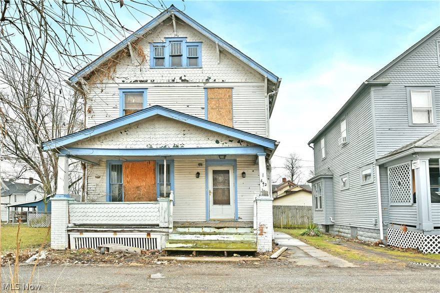 A project with the hard parts done, this Warren home presents tons of potential for both investment properties and beyond with its impressively spacious two-story layout. Just moments away from the ever-revitalizing downtown district, this residence awaits mid renovation as the major cleanout has been handled, ready for its next steps. Immediate exterior highlights include a covered front porch, rear storage shed, and an open neighboring yard. Inside the home, you’ll quickly note the rich woodwork that fills most of the first floor, adding tons of character and imposed quality alike. An immediate living room joins the main staircase as a fireplace adorns the far wall. Formal dining showcases lovely built-in cabinetry and overhead beams that exude style. The blank slate kitchen and accompanying half bath complete the floor as basement access drops away, leading to storage and workshop space. On the second floor, three spacious bedrooms branch from the landing. The first room enjoys hidden attic access, easily finished for a fourth bedroom or rec space. Meanwhile, a full bath rounds things out with brightly lit surroundings and a potential balcony walk-out.