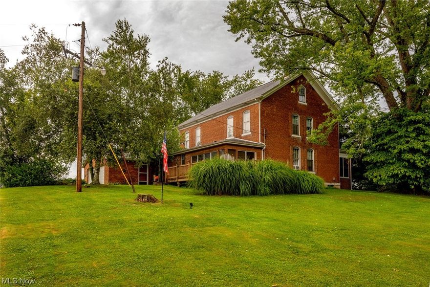 This timeless 2 story home is situated on nearly 2 acres with glorious mature trees to make you feel you are in a park like setting. As you walk into this wonderful home, you will see all the character the home provides. The home features 4 bedrooms, 2 full baths, a newer sunroom, lovely 10 ft ceilings, 2 decorative fireplaces, and an outstanding front porch you can relax on. There is also a large 2 car attached garage. This home is located just 10-15 minutes from the Ohio Valley Mall with all the restaurants and shopping you would need or you are 20-25 minutes from Wheeling.