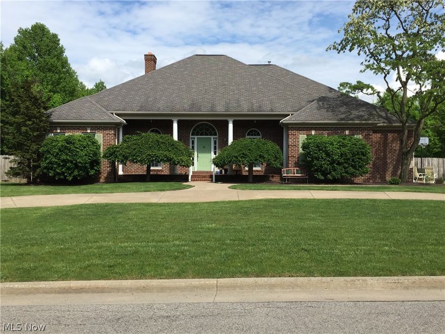 Wow ! 4-5 bedroom brick ranch with so many extra features you will need to come see it for yourself. Great location in Quail Hollow in the center of Boardman .Great floor plan which features Living room, family room with fireplace , formal dining room with large kitchen with custom made oak doors and cabinetry. Master bedroom with hardwood floors , master bath with jacuzzi tub and large walk in closet. Walk out from the master bedroom  to a large covered back porch overlooking in ground heated pool . Square footage does not include enormous finished basement with rec room with wet bar, full bath, additional bedroom or office , and a second laundry room. 2 car attached and heated garage, large concrete driveway with turnaround . Furnace and hot water tank 3 years . Well maintained by original owners. Call today to begin your own memories in this lovely home .