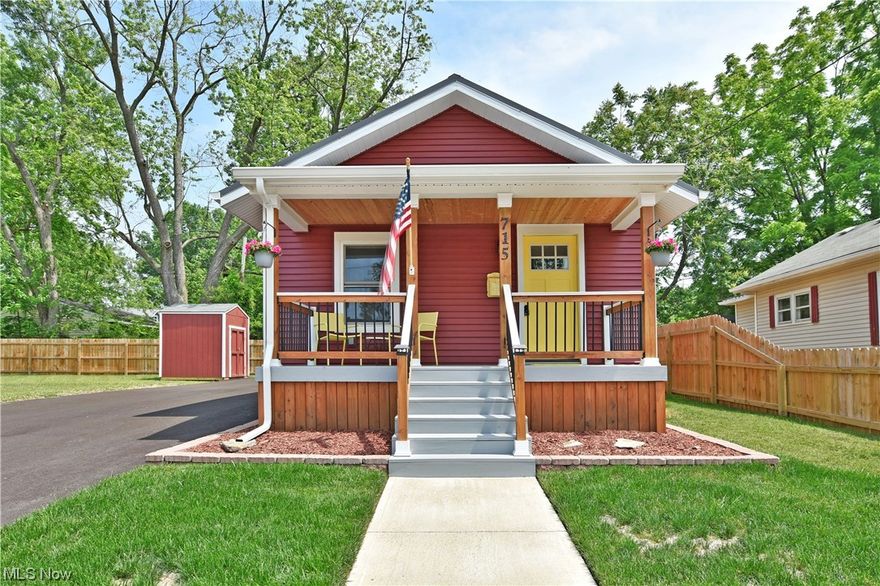 Impeccably charming, this colorful Warren home packs textbook style and design choices into an attractive, move-in-ready package! From top to bottom, inside and out this delightful property will quickly draw your attention from any angle. Sat on a prominent corner lot, the bold, red home defines curb appeal with its striking combination of bright white accents, robust metal roof, and cedar-colored trim and decking, all topped with an inviting yellow entry door. A fresh blacktop drive runs alongside as a pebble stone footpath brings you to a relaxing firepit. Meanwhile, the matching storage shed overlooks the stunning rear deck. Through the front door, the outstanding great room opens to reveal its engaging layout, trimmed in natural-colored flooring while the bright yellow accent wall sets the tone. Tall windows spill sunlight across the open floor plan while stainless appliances join the polished granite countertops that span the new kitchen. Sleek, modern lighting is found overhead a