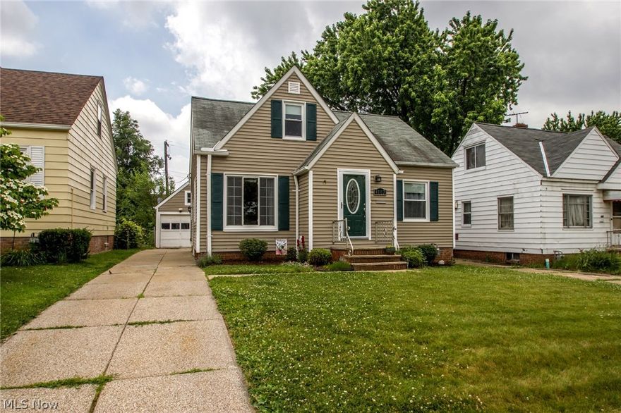 Welcome home to this completely updated, move-in ready home.  Located minutes from I-480 and shopping this 3 bedroom, 1.5 bath home offers a huge yard in an ideal location.  The kitchen is updated with beautiful wood cabinets with under-mount lighting, granite counter-tops, glass backslash, new appliances and a vinyl floor that withstands water.  Hardwood floors carry from the large family room, featuring a custom built-in TV area with components in the front closet, and continue into the 2 large bedrooms on the first floor.  The full bath has been completely updated.  On the second floor, the loft area and huge bedroom are on the second floor.  The basement was waterproofed, offers a half bath, large laundry area and a great rec room.  While this home offer so many updates inside the outside does as well.  The home offers new vinyl siding, blown insulation, new widows with transferable warranty, new furnace and A/C, new doors around the entire home and finishes with a new garage door