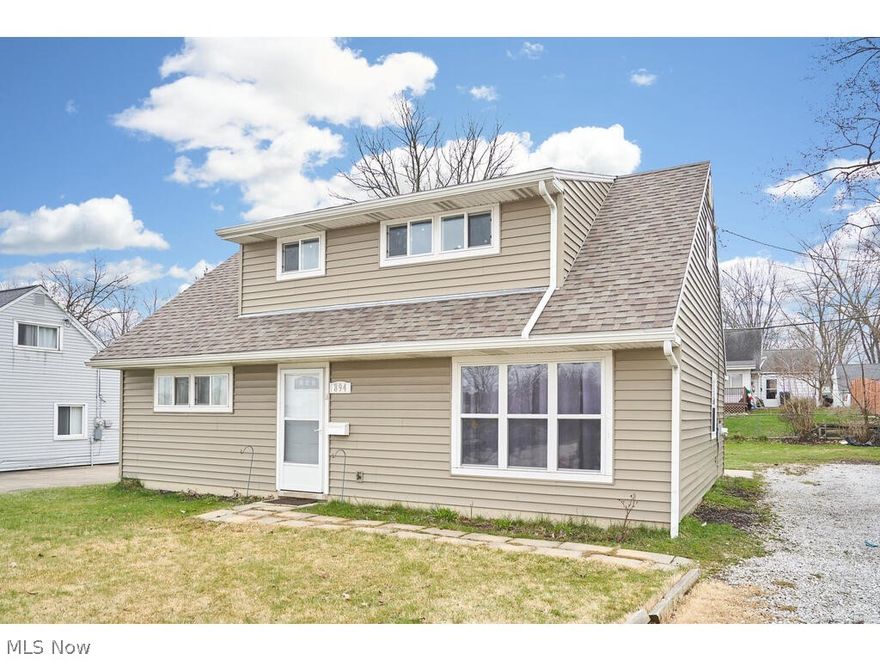 Welcome to this updated 4 bed, 1 bath cape cod home in desirable Cuyahoga Falls.  Before entering the home, you will notice the newer siding, roof and nice-sized backyard.  Walking in the front door, you will notice all of the windows that bring in natural light.  The family room features LVT flooring and is open to the dining room and kitchen, perfect for entertaining.  The updated kitchen overlooks the backyard and offers newer cabinets,  backsplash, and ceramic tile flooring.  The two bedrooms on the first floor could be used as an office or exercise room, and they both have LVT flooring.  On the second floor, there are two large bedrooms with newer carpeting. Additional updates (over the last 3 1/2 years): Laundry area added, electric, plumbing, drywall, insulation, all flooring, hot water tank, furnace, and painting. This home has the option to join the HOA for CMRA.  CMRA is a neighborhood private pool facility with a baby pool, regular pool, basketball courts, and picnic areas. 894 Grahamis a convenient location to freeways, parks, shopping & restaurants.