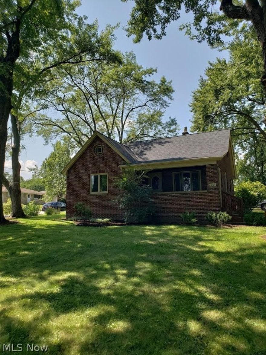 What a Location and What a Beautiful All Brick 1551 Sqft Cape Cod with 3 large bedrooms and 2 full baths. The upstairs bedroom has a very large walk-in closet along with its own Full bathroom. The other large bedrooms located on the main floor have hardwood floors. Enjoy your mornings or evenings on the front porch. Turn on the central air on hot days or stay warm and cozy with the forced heat on those cold Cleveland winters. . This is a very well maintained home-- waterproofed and new drain tiles and drain lines to the street were put in in 2005 as well as new electrical in 2005. The roof has many years left in it. Glass block basement windows installed 2018. Every room has Pella Windows. All appliances stay with this home and enjoy the piece of mind of a 1 year Home warranty included with this Great Home!!This Home will not last long-- Make it yours Today!!