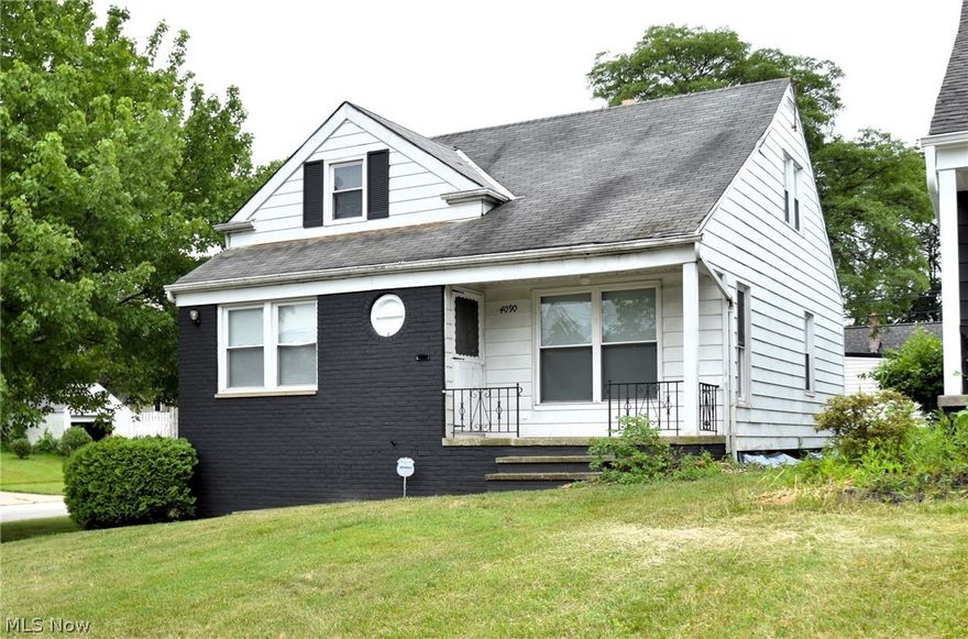 Imagine yourself in this fabulous  UPDATED Bungalow!  This 3 bedroom home has 2 bedrooms on the 1st floor with an updated full bath  and another bedroom  on the 2nd floor. Gorgeous  floors almost everywhere! Freshly painted throughout in "today's colors!! Wait until you see this large gorgeous white kitchen with luxury vinyl floors, granite & stainless appliances. Enjoy the spacious living and dining room. The inviting finished  lower level have a fabulous light & bright large family room with an updated beautiful 1/2 bath. Roof replaced last month! Windows replaced! Terrific yard!!  Close to th park and pool, so many restaurants, Whole Foods, University Circle, hospitals, museums & more! Grab your bags because you can move right into this outstanding home! Home warranty offered