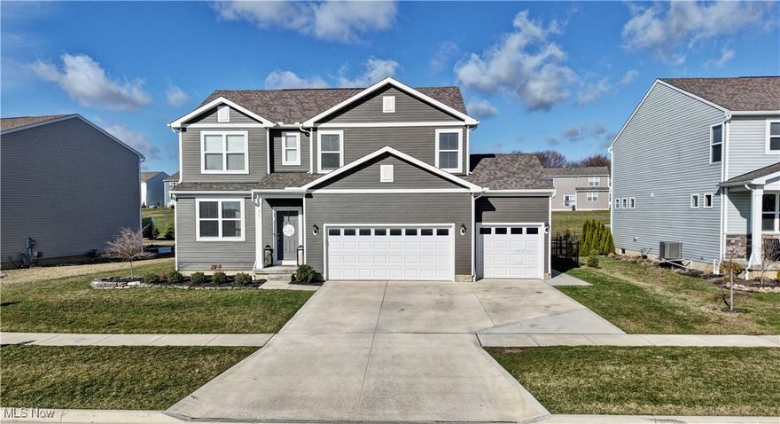 Welcome to this 3 Bedroom Gem in the Reserves of Tallmadge, before entering the home you will notice that this 2021 built home has been landscaped from top to bottom to highlight what this exterior property truly offers. If you're looking for that modern look with little to nothing to do, then step inside and be amazed. An office area sits right off the front entrance when entering, as you make your way into the living room you will grasp the open feel concept of the home. The kitchen comes with all appliances (Refrigerator, Gas Stove, Microwave, Trash Disposal and Dishwasher) ample storage is abundant with cabinets and pantry. The quartz countertops ascent the subway tile back splash, along with the island area that holds the kitchen sink. As you move upstairs you will find a loft area that allows for additional options while the 2 spacious bedrooms and full bathroom sit just off this area. The master bedroom measuring at 13x13 highlight the upstairs, with a master full-bathroom and a spacious walk-in closet (15x6) that puts the cherry on top for those worried about closet space. The 2nd level laundry room gives another perk to this gorgeous property. The newly finished basement (2024) offers those that want to entertain or just escape to the basement additional options with another full bathroom. With built-in shelves accenting your television you will be able to enjoy yourself at your private wet-bar. The heated 3-car garage accommodates those looking for that extra space with their home. But wait there is more, THE OUTSIDE! Yes, that's a 1/2 basketball court you're seeing with a top-of-the-line Gorilla Hoop equipped with lights for that nighttime pickup game. You can enjoy this area that is completely fenced in from your stamped patio (30x22) that offers a 4x4 gas fireplace, a (22x17) bright cover canopy. Pictures just don't do this property justice, so call Matt to schedule a private showing today to see this one of kind home in Tallmadge School District.