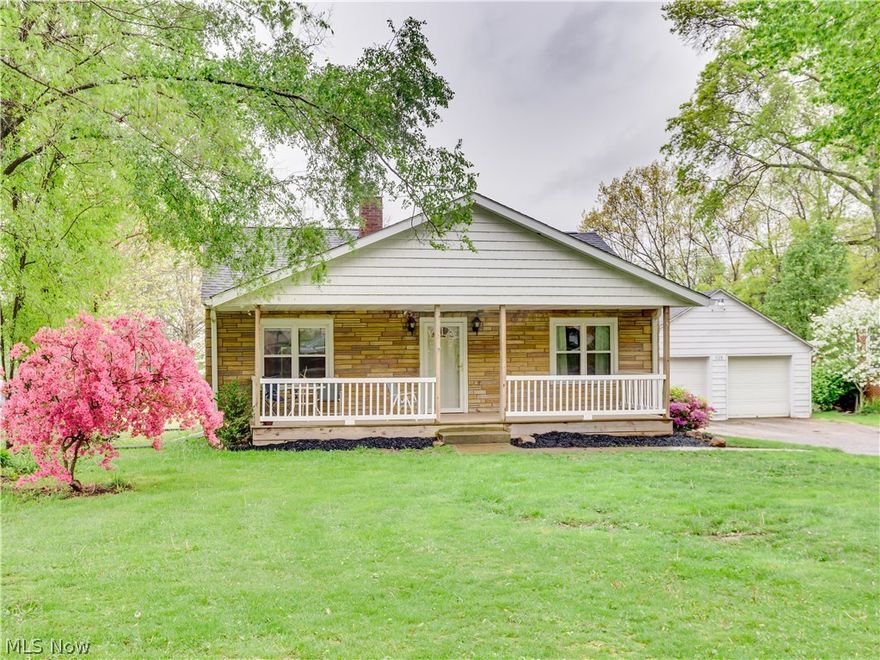 Hurry to see this new listing in New Franklin on over a 3/4 acre lot *  Hardwood floors in  the spacious  living room, dining room and both main floor bedrooms * Very nicely finished basement with a family room, 14 x 10 bedroom with walk-in closet, full bath and another room currently used as a bedroom. Enjoy relaxing on the  front porch( 3 years ) and enclosed back porch * Updates include but aren't limited to windows (4 years), 30 year dimensional roof (4 years), and furnace and central air (6 years) *Hot water tank (1 year old) * New well pump April 2017 * Two car detached garage * Glass block windows * Coventry School District * You will love the yard too!