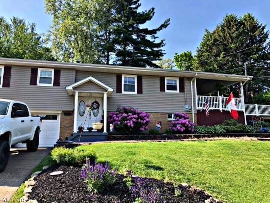 Check out this beautiful three bedroom home conveniently located in St. Clairsville. The spacious eat in kitchen includes custom oak cabinets, a large island, and pantry. Step right out of your living room and enjoy the large partially covered 40’x 35’ deck, and outdoor fire pit. The basement is partially finished with a wood burning fireplace and a full bathroom. Can’t forget to mention the two car garage with a work area. This house has so much to offer. Schedule your showing today!