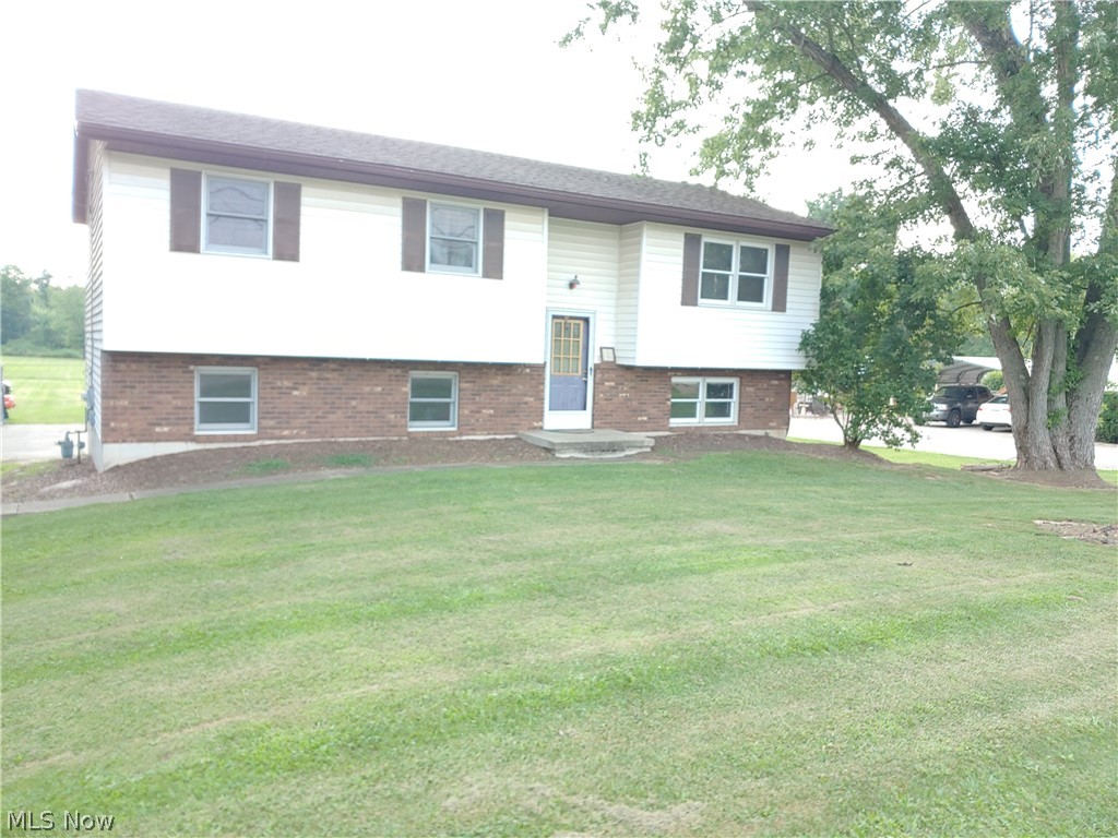 West Muskingum School District, Falls Township , 3 bedroom 1.5 bath. 1.5 acres large rear deck. Needs some tender loving care and updating