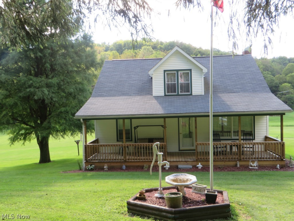 Hobby Farm 5.75 acres at Tappan Lake. Immaculate 4 bedroom, two story home. Hardwood floors, all updates have been done; newer roof, furnace with air, vinyl siding, replacement window, new porch, garage. 20x32 Barn, 18x32 shed. Outdoor wood burner. Mineral rights reserved by seller.