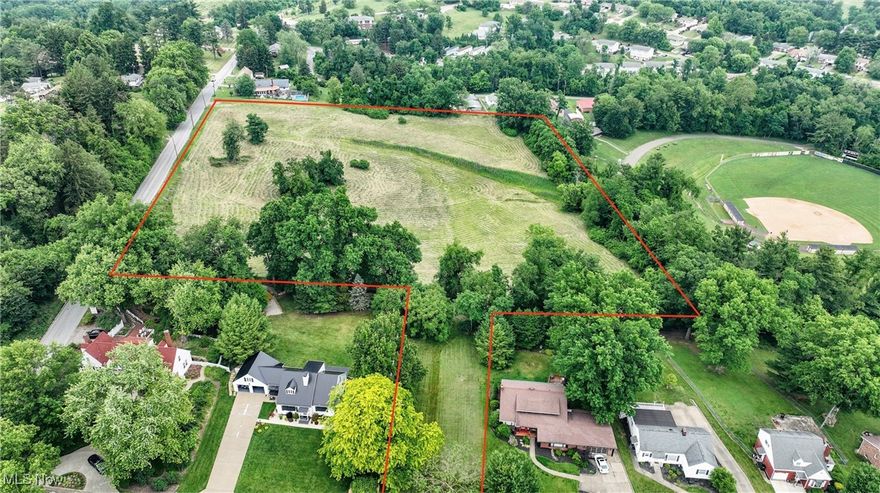 Just over 4 acres of vacant land ready for a new home in a great location! Water and Sewer hookups available. This lot will have access from Walnut Avenue. New survey will be completed prior to a closing. Oil and gas rights are not owned and do not convey.