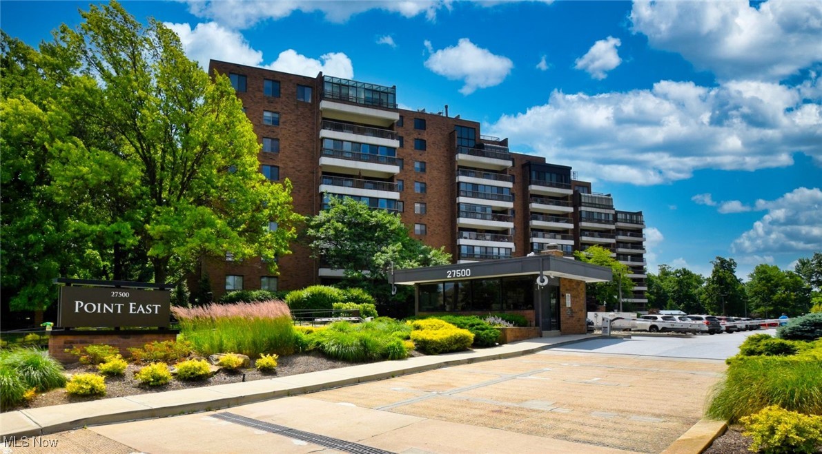 Luxurious and ideally located, this sought-after Point East condominium offers refined living with 3 bedrooms, 3 full baths, and a fabulous open floor plan. This lovely condominium is filled with natural light and is just steps from the elevator. A gracious entry flows into the elegant living and dining room, complemented by a library/den that connects to the wonderful large kitchen featuring granite countertops, custom cabinetry and a spacious breakfast area. The primary suite impresses with its oversized bedroom, large walk-in closet, and spa-like private bath, while two additional bedrooms with 2 more full baths and a separate large laundry room complete the layout. Enjoy serene tree-lined views from the expansive balcony, perfect for relaxing or entertaining. Two prime parking spaces in the best location! Point East is a premier luxury community offering a guard-gated entrance, underground parking, guest suites, a party room, fitness center, pool, tennis courts, and on-site management--all in a prime location near shopping, dining and hospitals. Just a short drive to University Circle, museums and the theater district.