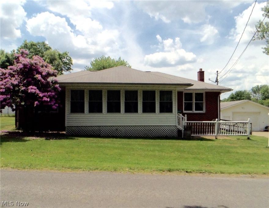 Great country property close to town with lots of amenities. Very spacious with nice floor plan. Beautiful hardwood floors in living room, dining room tv room and bedrooms. Kitchen has ceramic floors and plenty of newer oak cabinets. Enclosed sun porch and first floor laundry. Full basement with additional storage and cabinets. 2 car garage with storage room or workshop. Ramp on back deck. Outside garden has asparagus, strawberries, blueberries and pears.  New septic system Has been installed.