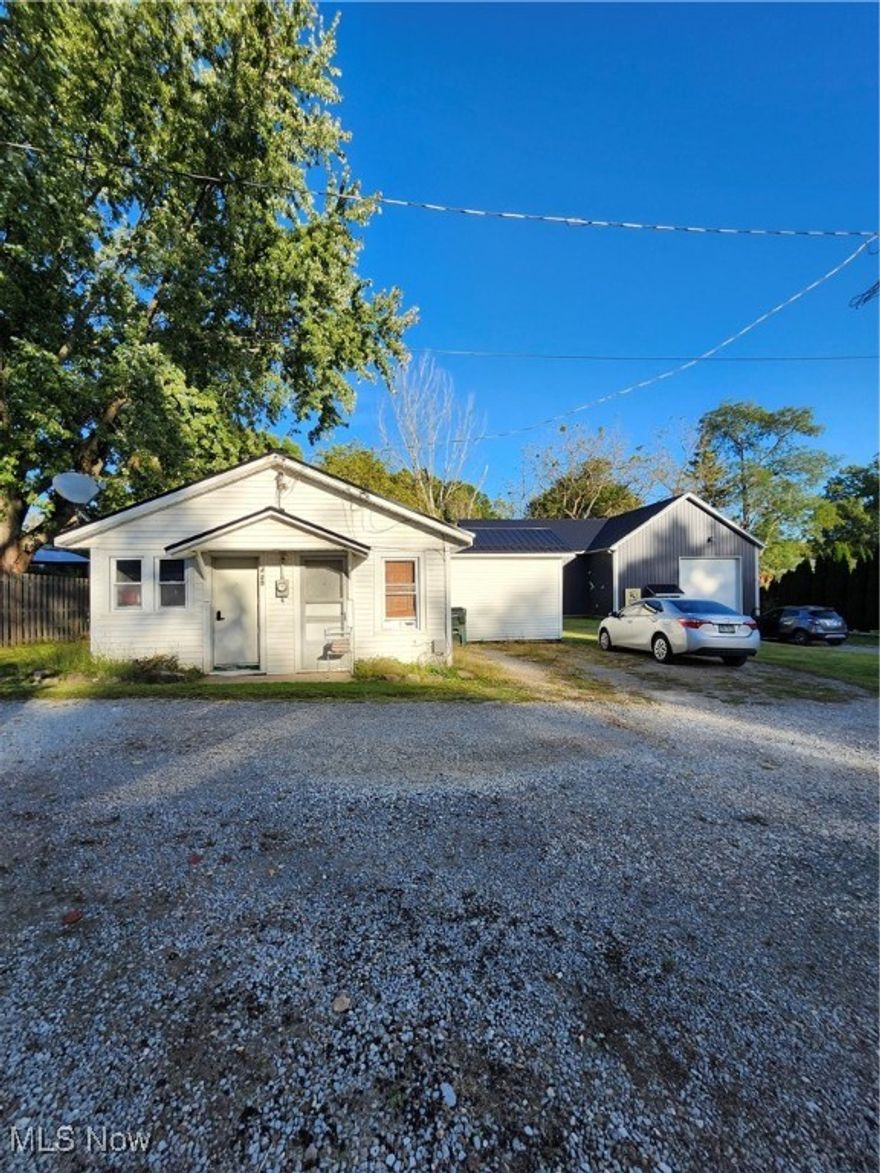 A rare opportunity to own a single family dwelling with a commercial building on one parcel in Dalton. There is no zoning so if you can imagine it, you can use the space for it. The house has two bedrooms, one bathroom, and large laundry room that offers additional storage. Kitchen cabinets are updated and the appliances are about 8 years old. The home has vinyl siding and vinyl windows. The furnace was installed in winter 2025. The steel roof is about 6 years old. The flooring will need to be replaced. The home is currently rented through June 30, 2026. The commercial building was built in 2017. It has a block foundation. With 2200 square feet on the main level, plus a loft, it has ample space. It has an air compressor, half bath, floor heat, and an open loft that also has an office and conference room. This property is agent owned.