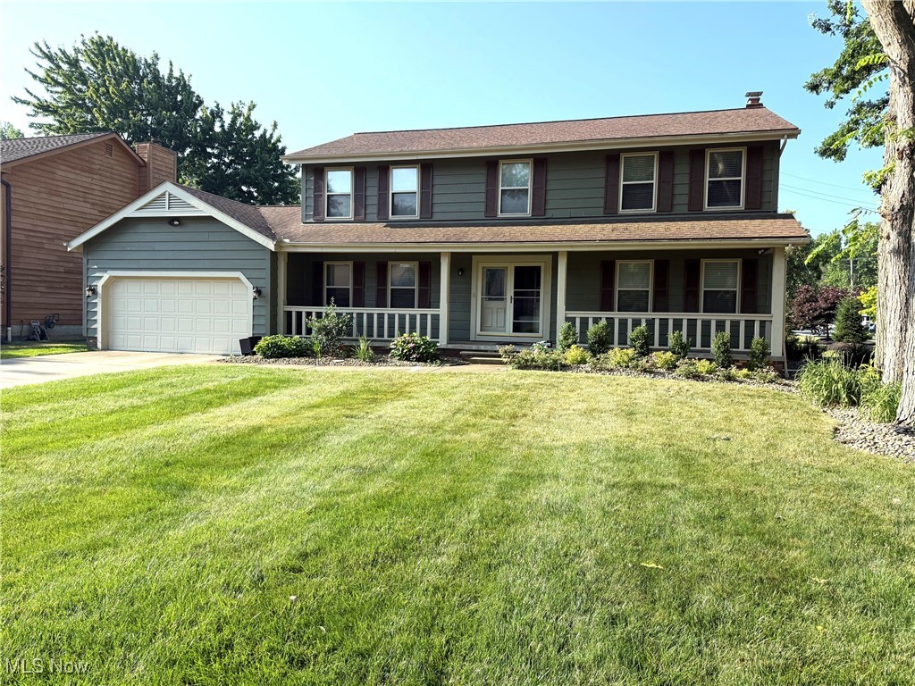 Welcome to this impressive Willoughby 4-bedroom 2.5 Bath Center Hall Colonial with attached garage and full basement. This property with over 2500 sq ft. of living space has a nice appeal and style as you approach. Notice the beautiful landscaping and the covered front porch as you enter the double door entry and foyer which leads to the first floor living space. A dining, living and family room are featured and showcase the beautiful, engineered wood flooring which is throughout the main floor offering high quality and low maintenance. This first-floor space is perfect for entertaining being adjacent to the kitchen and enclosed sunroom. You’ll experience great views of rear of the property and fenced yard from the sunroom as well. The kitchen with breakfast bar and seating has an abundance of cabinets while including granite counters, and 3-year-old appliances. The spacious dining room is perfect for gathering with family and friends. In addition, a large but cozy family room with brick feature electric fireplace keeps everyone connected during meal prep. Also, the 3-season enclosed porch is heated for those not so warm fall evenings. The home includes a convenient first floor laundry and half bath just off the hallway near the garage entry. Upstairs you find four bedrooms which include a main suite with walk in closet, dressing area with vanity and ensuite bath with shower. The 3 additional bedrooms are generous in size and include ample closet space. Checkout the full basement which has newer laminate flooring and plenty of possibilities as additional living space or fitness and play area. An abundance of additional storage is available in this space. A two-car attached garage is plenty big with a separate workspace and access to the rear fenced yard. Easy access to Rt 90 and Rt 2 as well as shopping and restaurants. Cul-de-sac street and sidewalks make this special for evening walks. Check this out today!