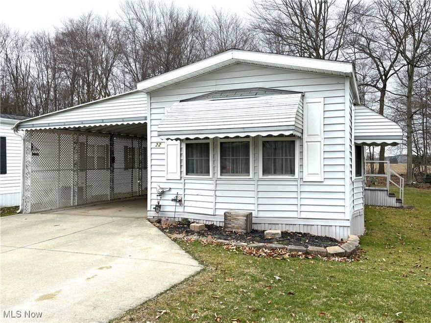 This 1995 Shamrock mobile is in Southern Terrace Mobile Home Park in Columbiana. This 2 bedroom 2 bath home features a large living room with bay window,  kitchen with appliances, and skylight in kitchen. Utility room off kitchen has pantry and laundry area. Master bedroom includes private bath and 2 closets. Second bedroom also has bath with walk in shower. Patio door from kitchen leads to 12x30 carport, also a great place for patio area. Additional parking in driveway. Storage shed included. Lot rent includes trash service. Southern Terrace is a 55+ community. Buyers must be approved by park management.