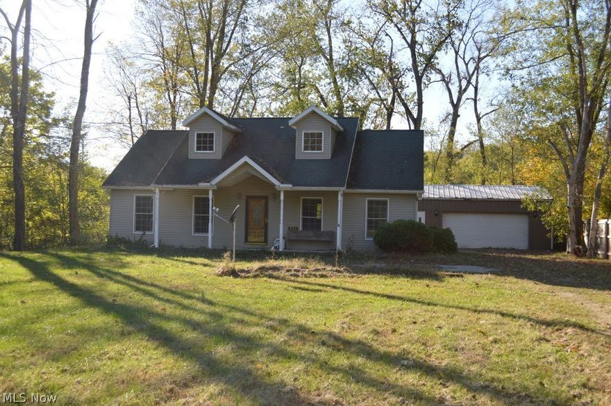 Sitting on the Muskingum River, this home offers an open play pen style living with kitchen/dining/family open to each other with an abundance of windows letting in lots of natural light.  Kitchen offers oak cabinets, bar and view out kitchen window of river.  Living room exits to front porch and large level yard.  Master suite with sliding door to back deck to sit and enjoy the river view, master bath offers laundry.  24'x36' pole building serves as 2 car garage.  Estate, home being sold "as is".