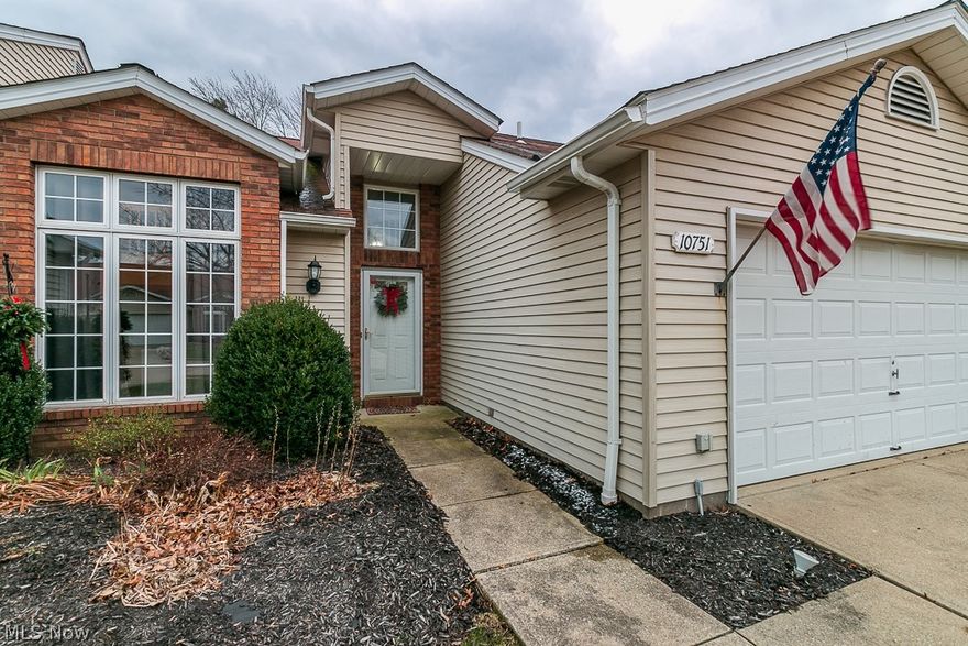 Move-in ready and updated Strongsville Condo with over 2200sf of living space! Open living room with vaulted ceiling, recessed lights and new luxury vinyl plank flooring (2020). Beautiful wood-burning fireplace for those cold evenings! Kitchen features beautifully stained kitchen cabinetry(2021) with ample cabinet space, new quartz countertops(2021), newer stove/dishwasher and overlooks the dining area! Kitchen offers sliding door that  opens to the private back patio. Large first floor bedroom includes new luxury vinyl plank flooring(2021), spacious walk-in closet and connects to the first-floor full bath that offers new quartz countertops(2021) and brand new walk-in shower(2021)! First floor laundry room complete with storage cabinets and utility sink! Bright second floor loft with tons of natural light overlooks the living room. The private master suite includes a large walk-in closet and private bath completed with  brand new walk-in shower(2021) and jetted soaking tub! Enjoy your
