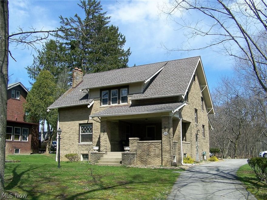 Quality craftsmanship shows proudly in this 2 story brick home with hardwood floors, built-ins and original woodwork in East Palestine Ohio.  Step into old world charm with a formal dining room, living room with pocket doors and wood burning fireplace, large covered front porch, wide staircase and First floor office / 4th bedroom with 1/2 bath attached. Home offers a newer roof with 3 dimensional shingles, newer Thermopane windows, stucco ceilings and freshly painted through-out in 2015. Kitchen offers newer countertops, cabinetry and stainless steel appliances. Upstairs offers a large bathroom with new tub and surround installed by Bath Outfitters, new sink, vanity and a walk in storage closet in the bath!  Also all 3 bedrooms offer their own walk-in closets, have hardwood floors and built-in shelves and cupboards.
Outside you'll find a large backyard with a 12 x 12 Playhouse, a large workshop storage building 12 x 24 with electric and a detached 2 car garage with 220 amp, opener and