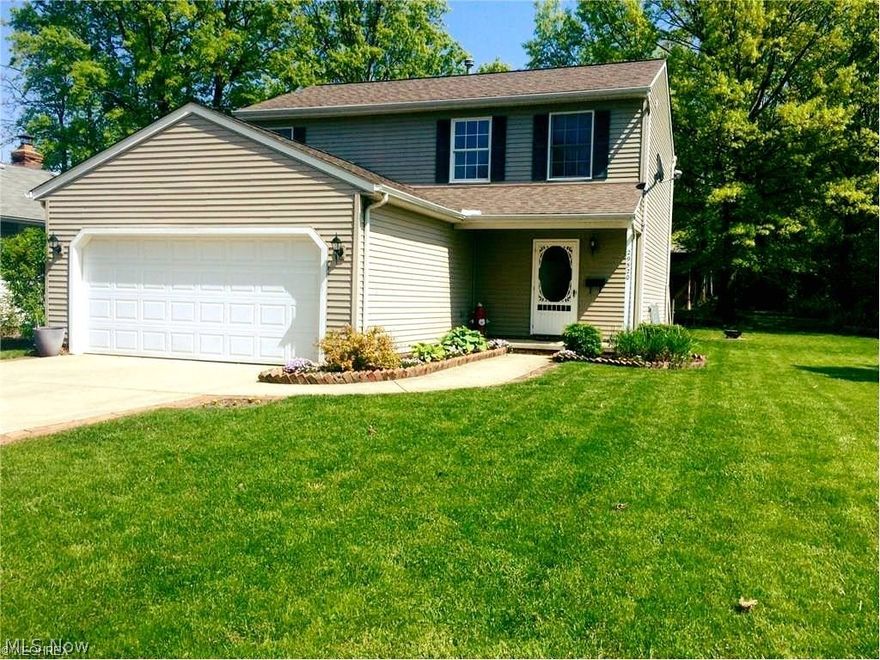 Welcome to your chance to own this 3 Bedroom 2 Car garage Custom Built Colonial. Beautiful Foyer Entrance that leads to the Large Living Room with Gas Fireplace that leads to the Giant Eat in Kitchen with Beautiful and Abundant New Cabinetry, new Counters and Top of the Line Stainless Appliances. First Floor Laundry and Half Make Bath complete the main level. Journey Upstairs and you will Find 3 Large Bedrooms with more than enough Closet Space and a Full Bath. Off of the Kitchen is a Walk Out to the Fenced in Manicured Back Yard with Patio.