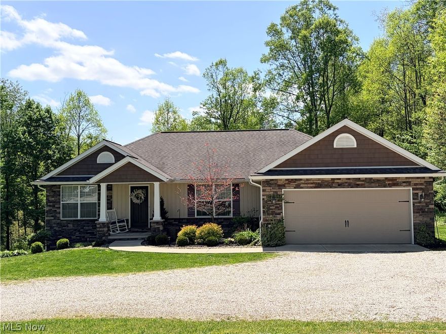 Well-maintained 3BR/2BA Ranch Home situated on a corner double lot in the Lake Buckhorn Community. Conveniently located 1/2 mile from the north gate, and a 1/2 mile from Area 8. Built by Schlabach Builders, this home features quality craftsmanship throughout, including solid wood doors and a cozy ventless gas fireplace. The split-bedroom floor plan provides added privacy, while the Cathedral ceilings and an open kitchen, dining, and living area create a spacious feel. First-floor laundry adds to the ease of one-level living. Enjoy the outdoors from the 12x12 maintenance-free deck overlooking the large backyard, or unwind in the hot tub on the 22x26 stamped concrete patio. The yard provides plenty of space for gardening, play, or pets, and includes a 10x20 storage shed. The 13-course walkout basement with large windows offers excellent potential to finish for additional living space. Basement is plumbed for 3rd bath. Located in a private lake community with access to amenities, this home combines comfort, functionality, and outdoor enjoyment.