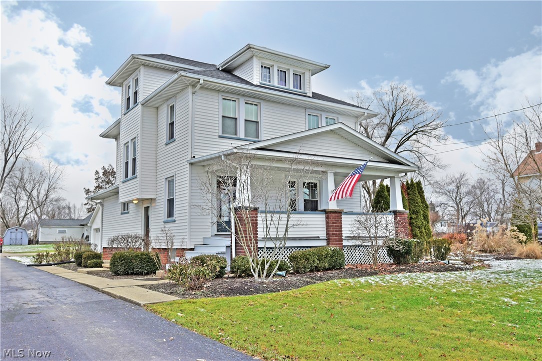 This is the one you've been searching for! Welcome home to 5335 Mahoning Ave NW located in Champion! The oversized front porch greets you as you pull up to this gorgeous home. Step thru the front door and into the warm and inviting living which is home to stunning woodwork and high end Mohawk carpeting (2018) Steps away a beautifully updated kitchen awaits. KraftMaid cabinetry, Corian countertops, a lovely eat in area with a bay window, Mohawk laminate flooring (2018) and a pantry join a center island making this a dream kitchen! As you step into your dining room the laminate flooring continues. There is plenty of space for formal dinners, game nights or maybe you can curl up on the window seat and read a good book! French doors take you out onto a covered patio and access to your incredible backyard. Upstairs there are 3 bedrooms and full bath with new flooring! The basement plays host to a lovely family room with gas fireplace, large laundry room with lots of storage, a half bath a